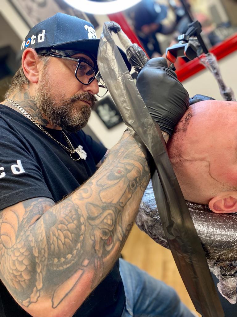 Scalp micropigmentation Tattooed skull in {Location}